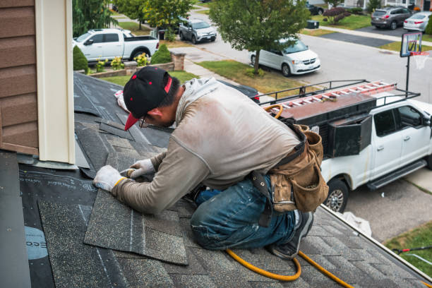 Professional Gutter Repair And Installation technician working in Melrose, IA